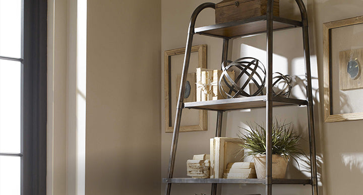 Decorative ladder shelf with books and ornaments