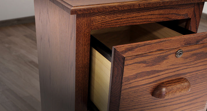 Open drawer of a wooden file cabinet